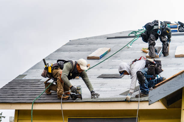 Professional Gutter Installation technician working in Harris, NY